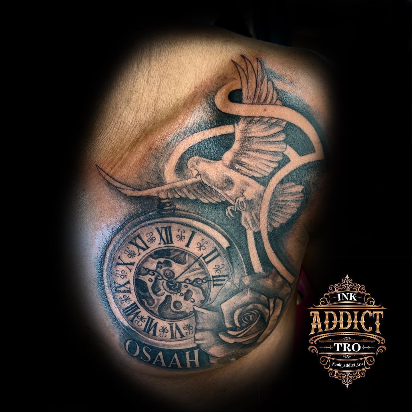 Clock and dove realism tattoo on the shoulder by Trocon Talhouk