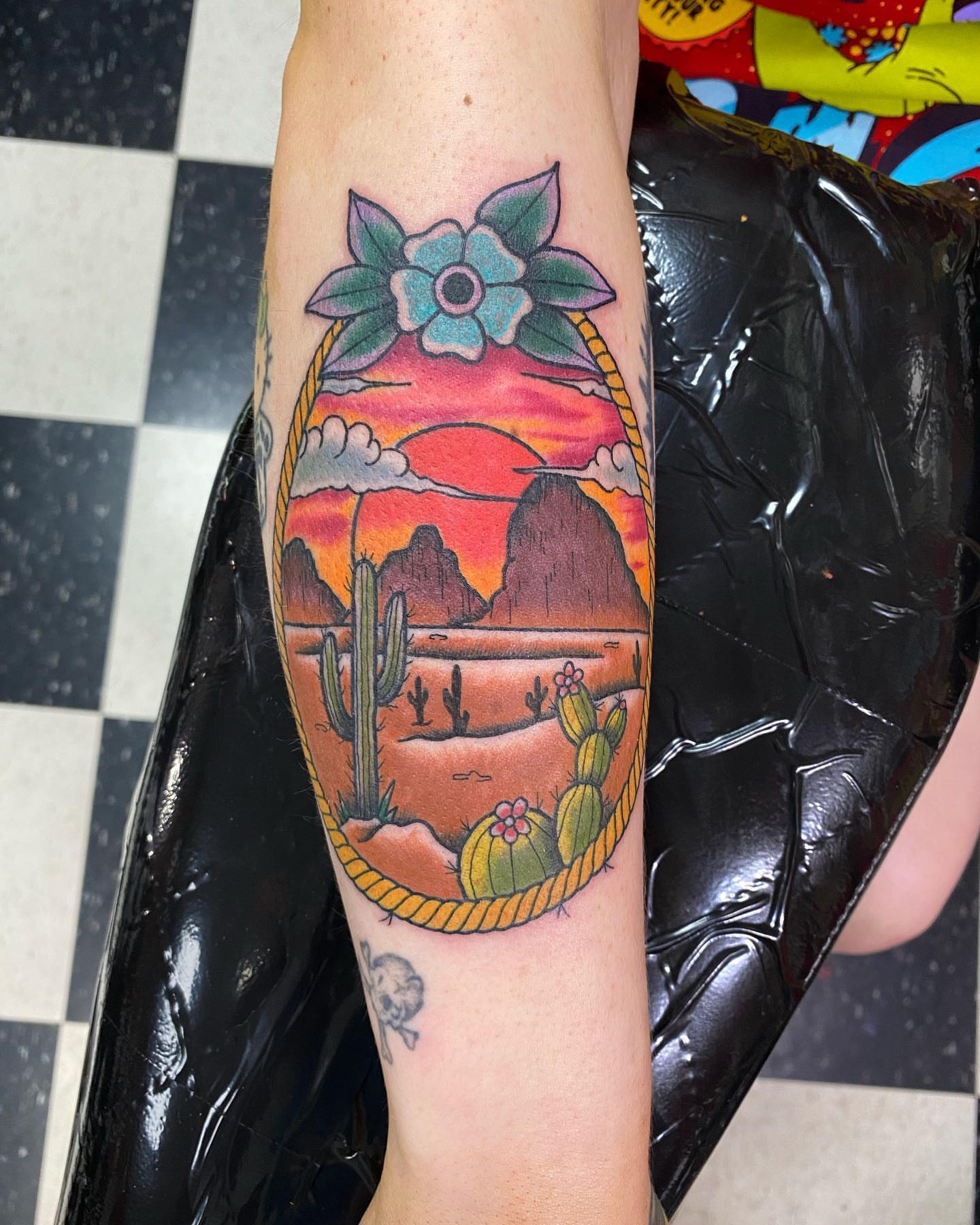 Desert sunset American traditional tattoo on the forearm by Jake Snoddy, Franklin, Tennessee