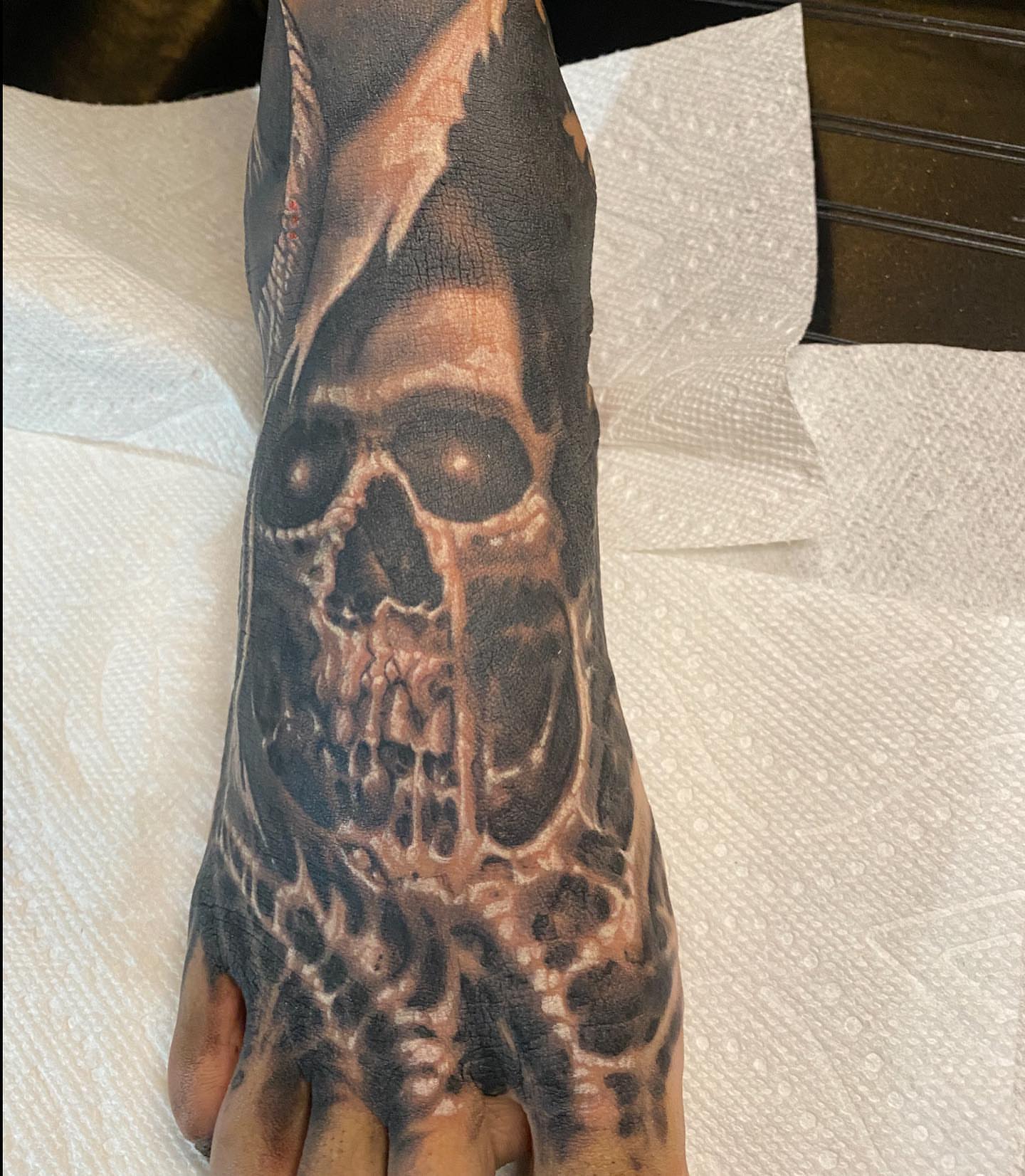 Skull realism tattoo on the foot by Shaine Smith, Durham, North Carolina
