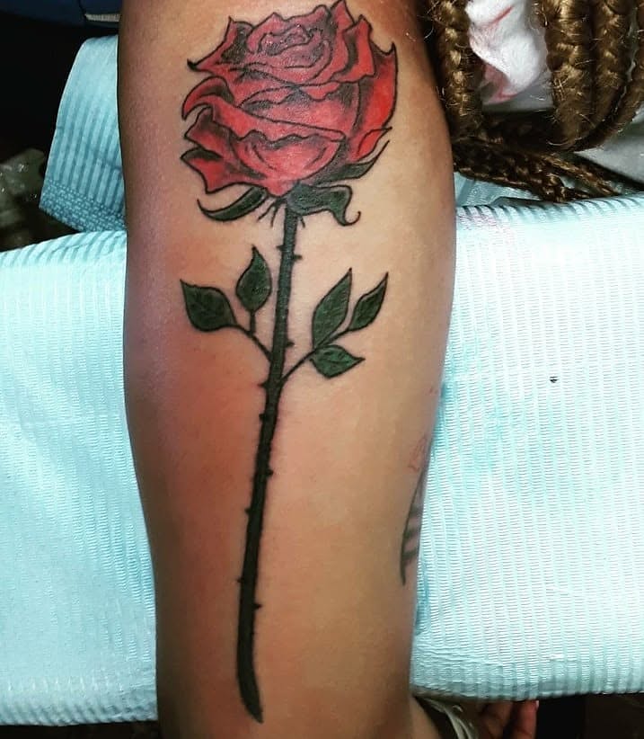 Rose realism tattoo on the forearm by Jacci Gresham