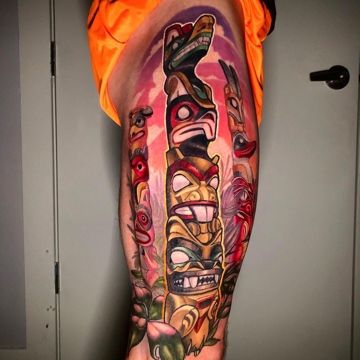 Totem pole tribal tattoo on the leg by Tim Stafford