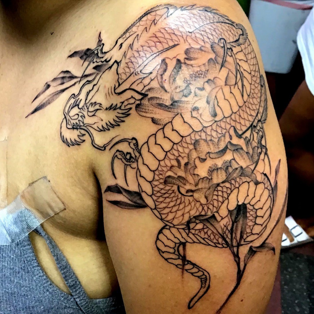 Dragon black and grey tattoo on the shoulder by CASEY JENSEN ✨ Fort Collins CO