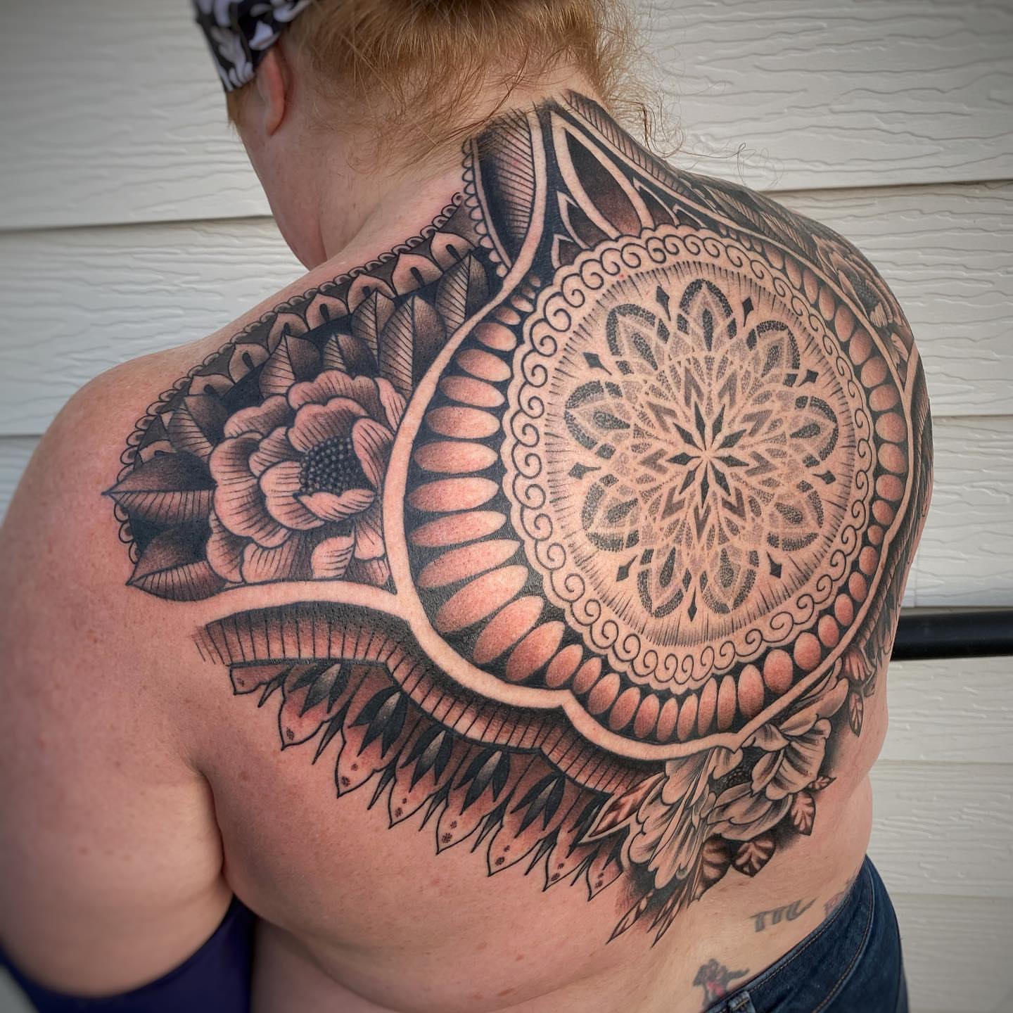 Mandala geometric tattoo on the back by Derek Hutchison, Des Moines, Iowa