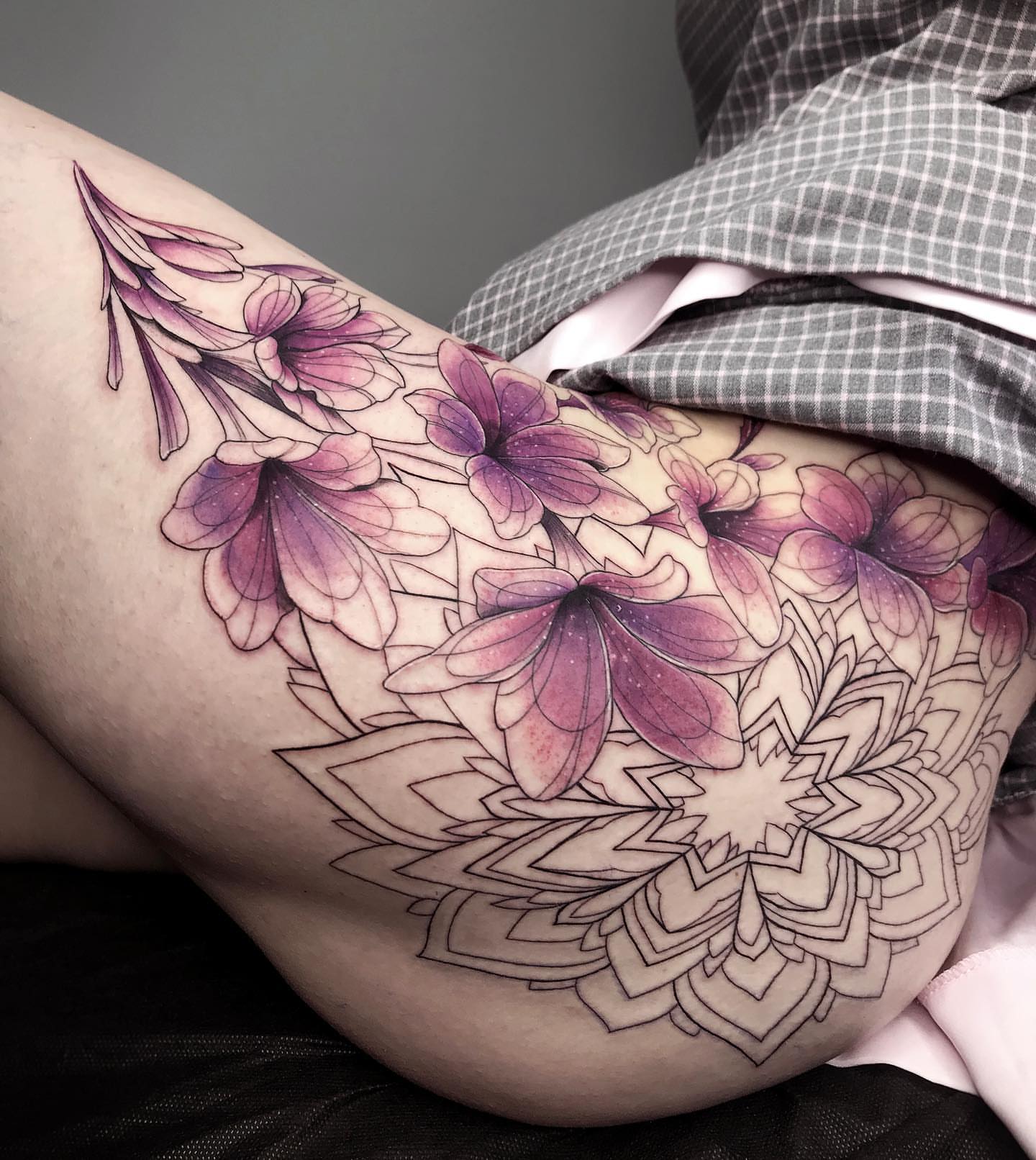 Floral mandala geometric tattoo on the thigh by Tattoo San Diego