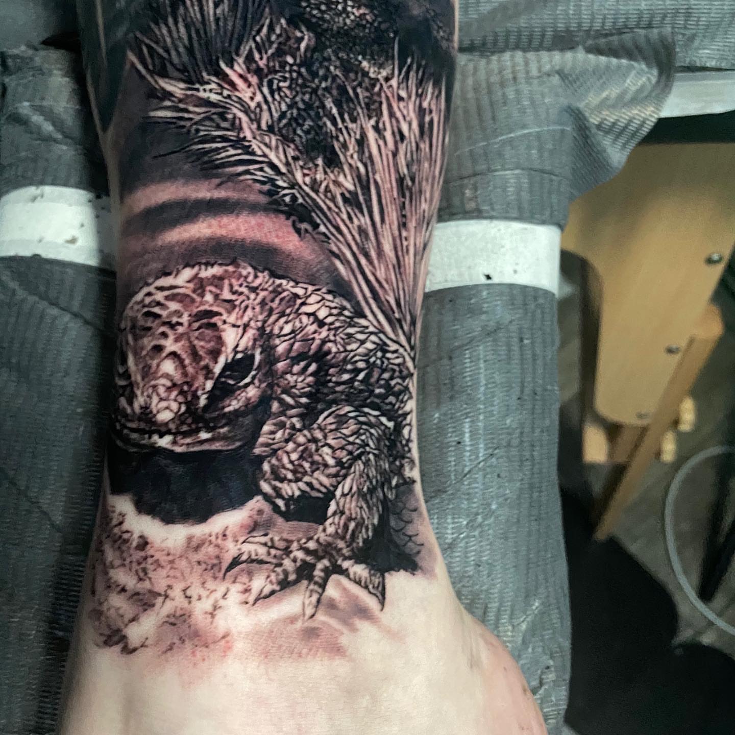 Lizard realism tattoo on the forearm by Brian Cassidy