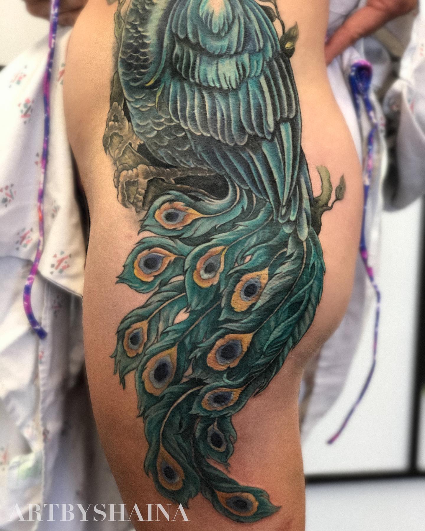 Peacock realism tattoo on the thigh by ππ·π°πΈπ½π°