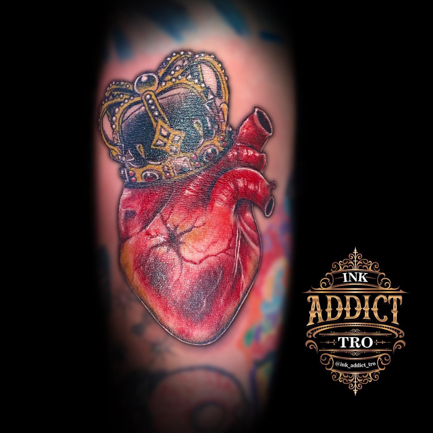 Heart with crown realism tattoo on the forearm by Trocon Talhouk