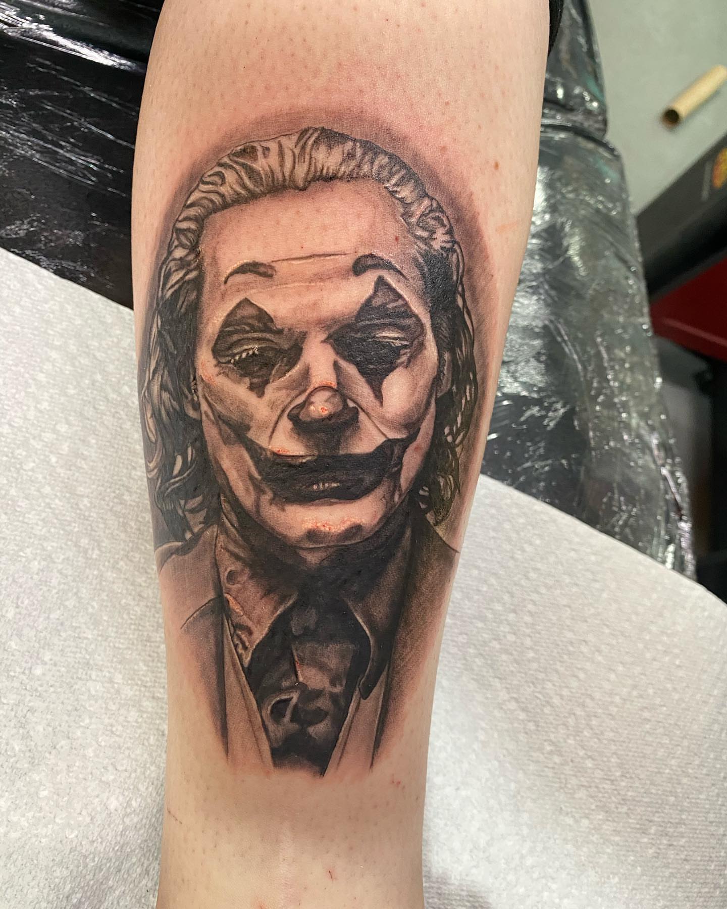 Joker realism tattoo on the forearm by Adrian Dominguez, Las Vegas, Nevada