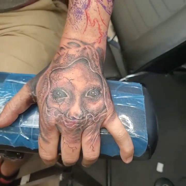 Creepy face realism tattoo by André Brazil