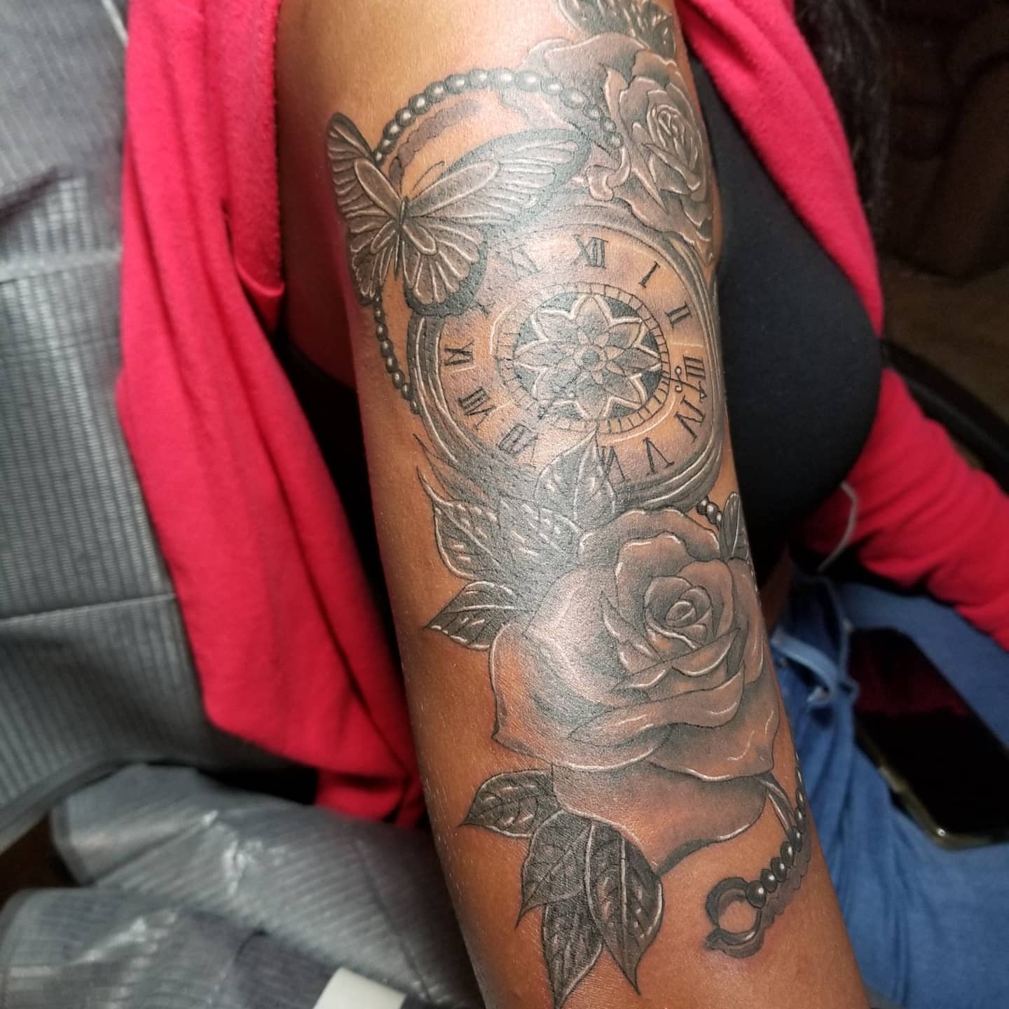 Clock and roses realism tattoo on the forearm by Miguel-C, Houston, Texas