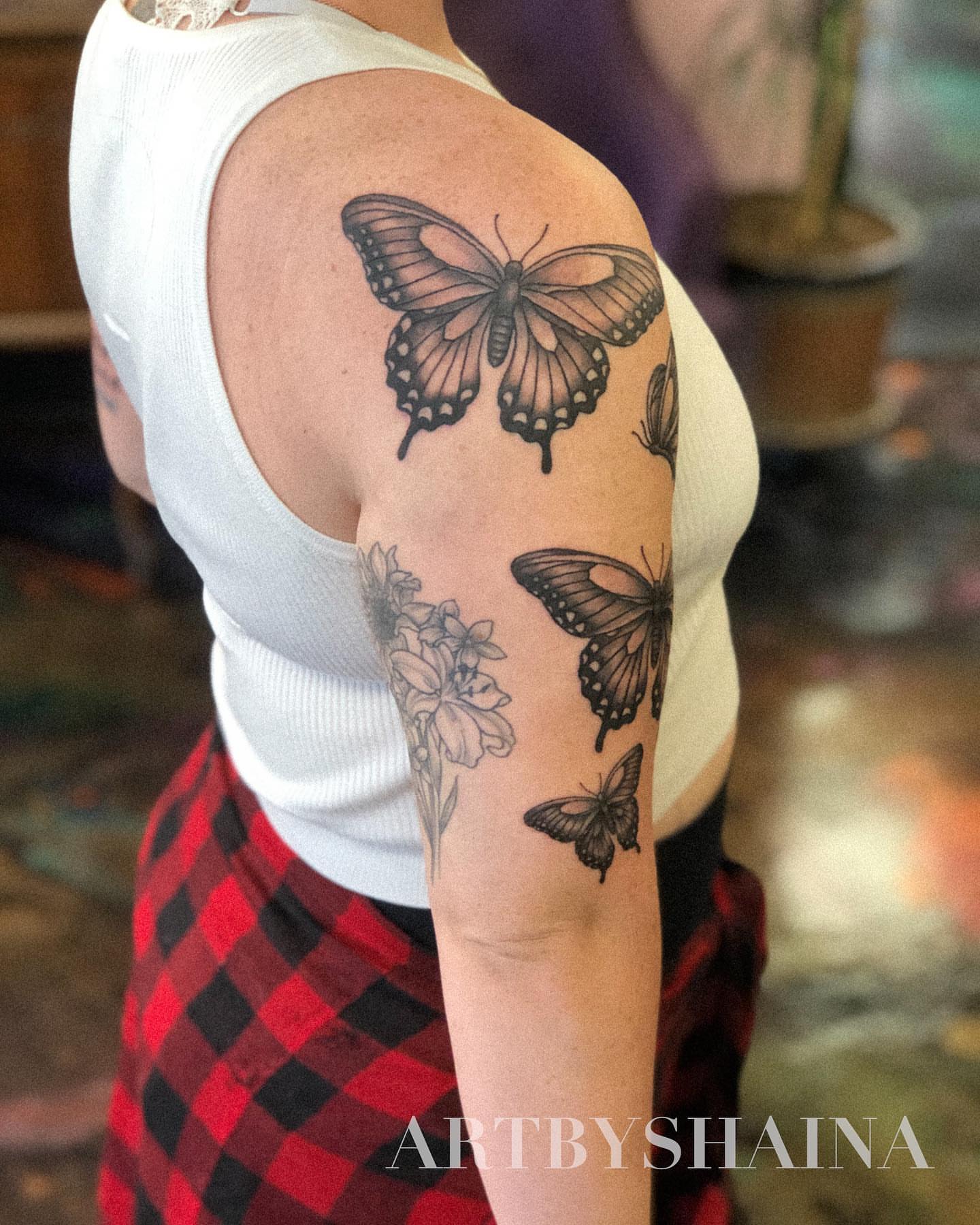 Tattoo by @artbyshaina — black_and_grey, realism