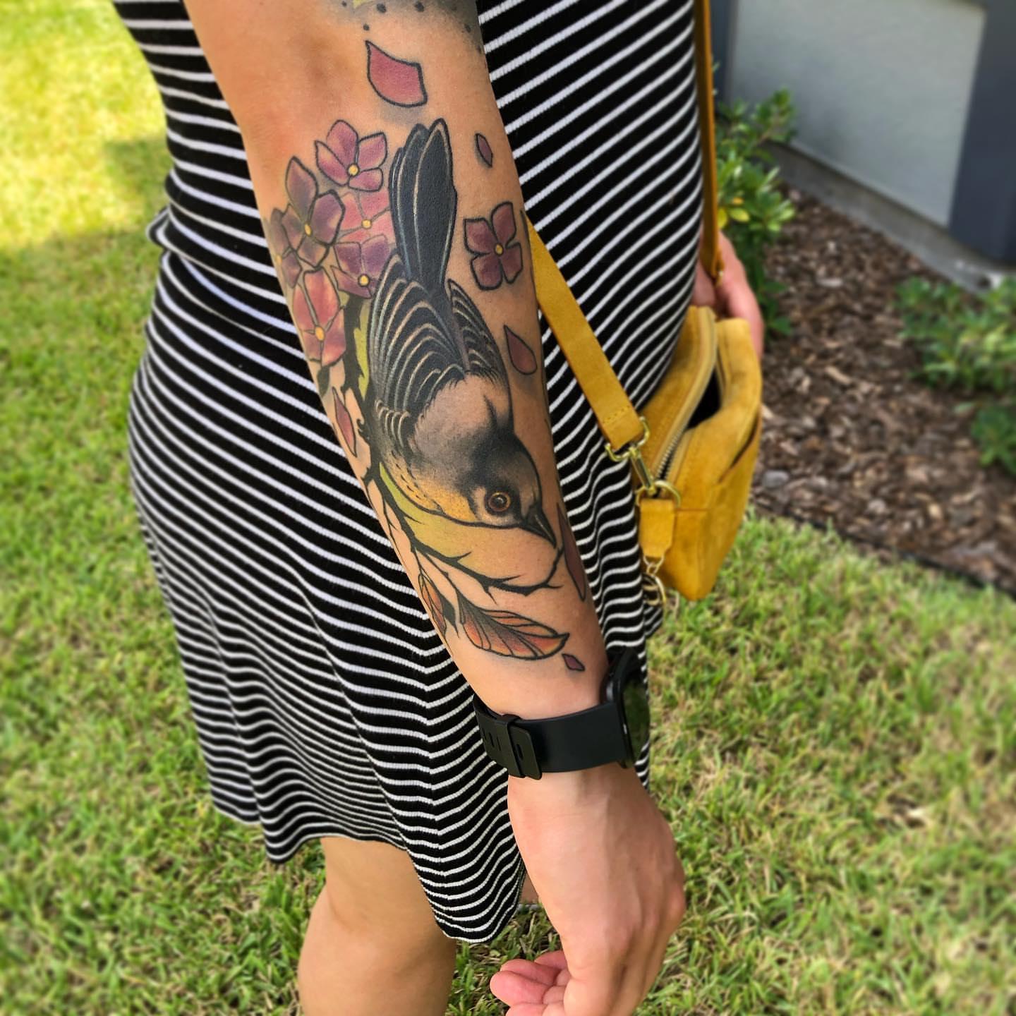 Bird and flowers realism tattoo on the forearm by ceci✨, Edinburg, Texas