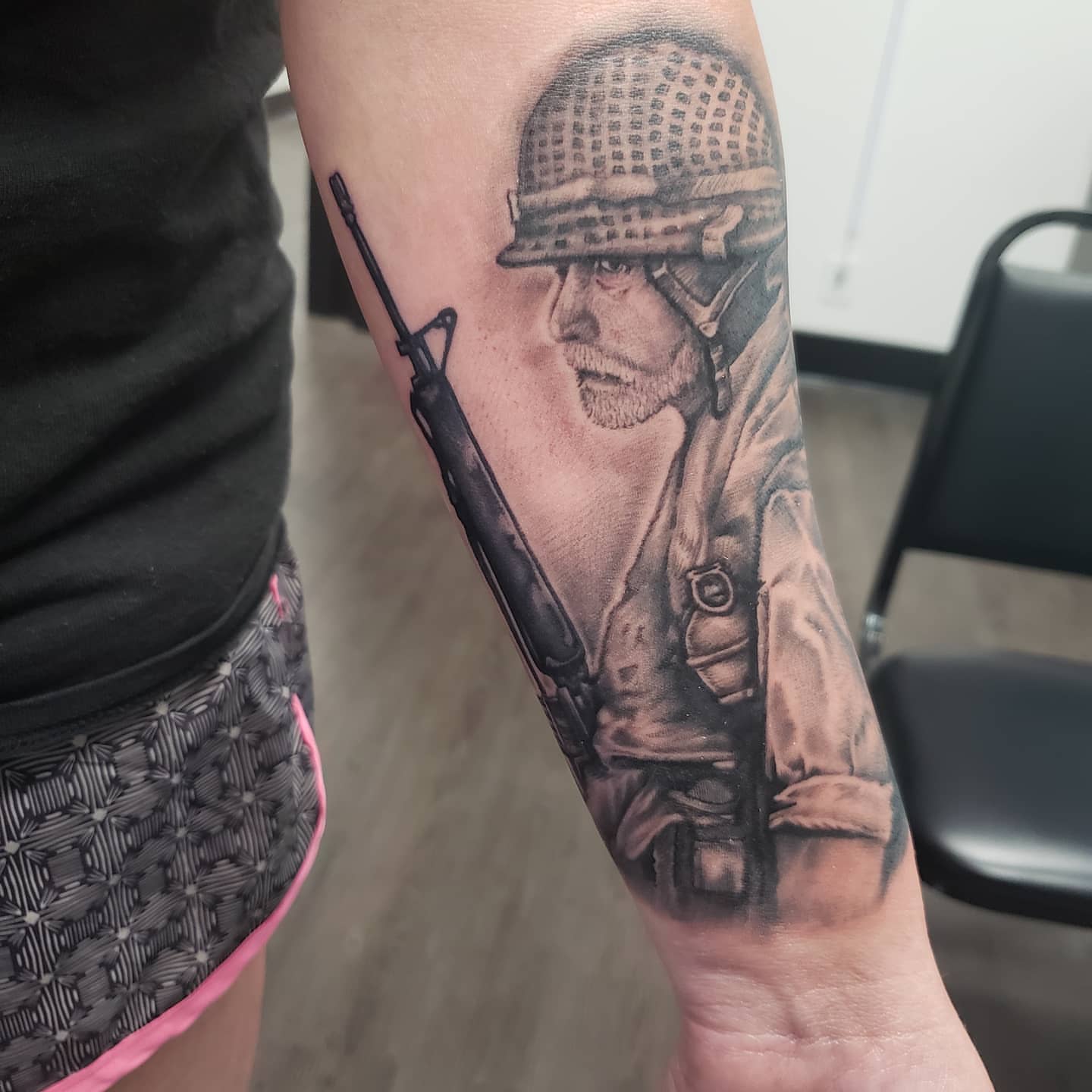 Soldier realism tattoo on the forearm by Jon Goad