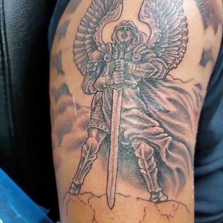 Angel with sword realism tattoo by André Brazil