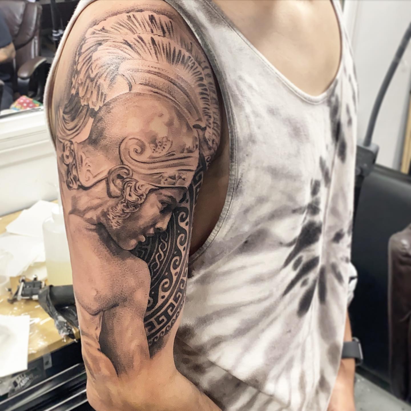 Ancient warrior realism tattoo on the upper arm by Creeper tattoo
