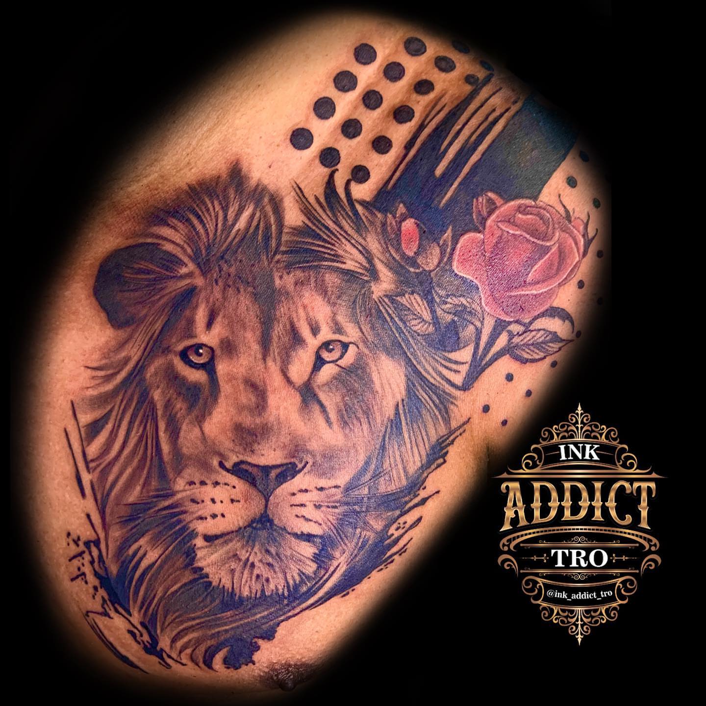 Lion and rose realism tattoo on the shoulder by Trocon Talhouk