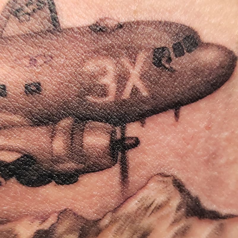 Airplane black and grey tattoo on the forearm by @doctorze