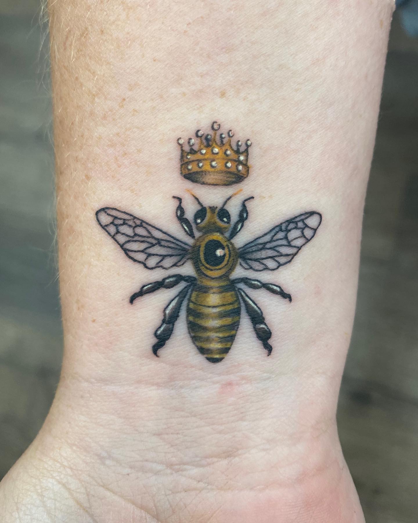 Bee with crown realism tattoo on the forearm by 𝕤𝕒𝕣𝕒𝕙 𝕞𝕠𝕣𝕒𝕟📌, Dayton, Ohio