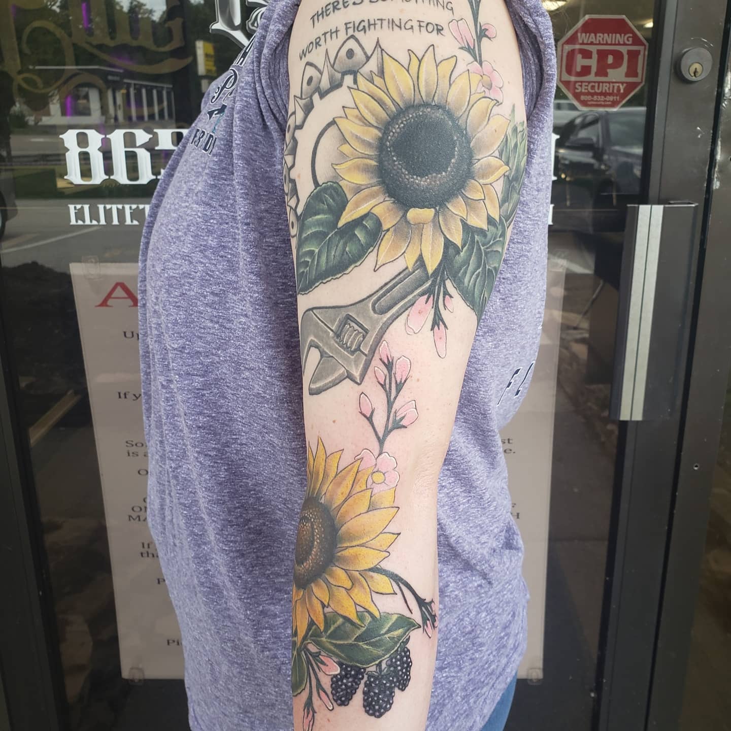 Tattoo by @oh_my_goad — realism, lettering_script