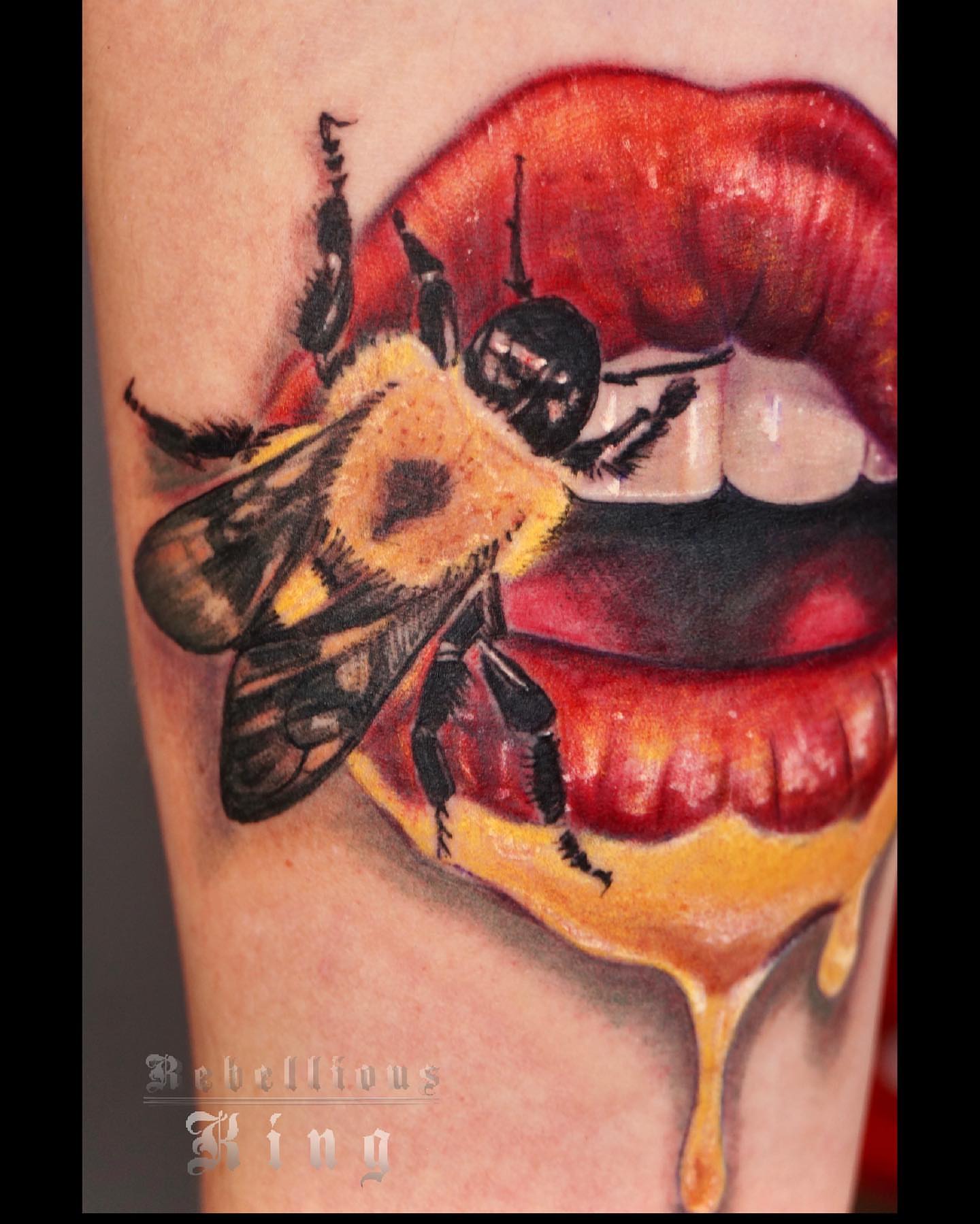Bee and lips realism tattoo on the forearm by ๐ฝ๐๐๐๐๐๐๐ ๐ถ๐๐๐