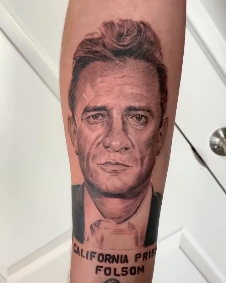 Johnny Cash portrait realism tattoo by Carlos Macedo Tattoo