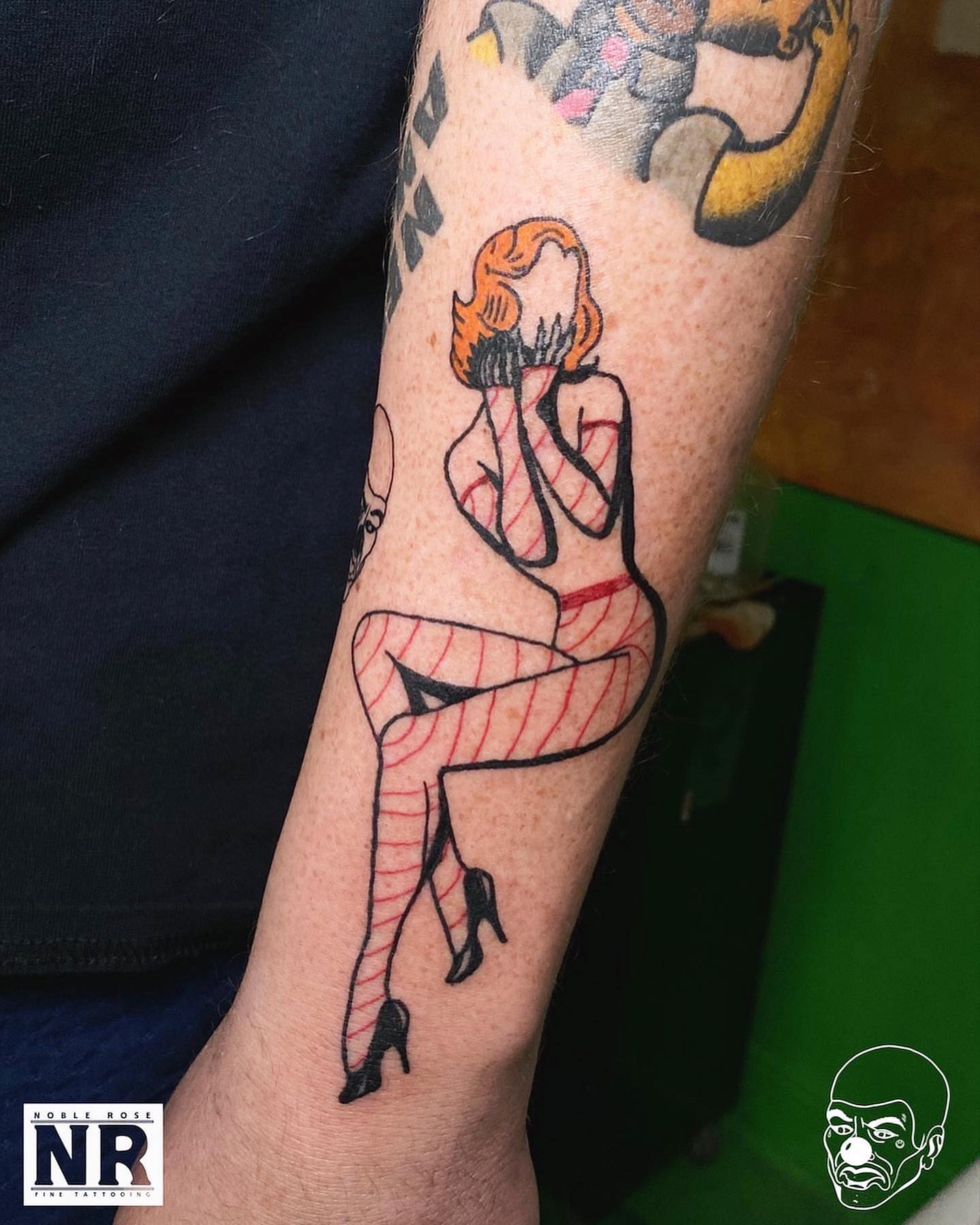 Pin-up girl American traditional tattoo on the forearm by πππ πππππππ