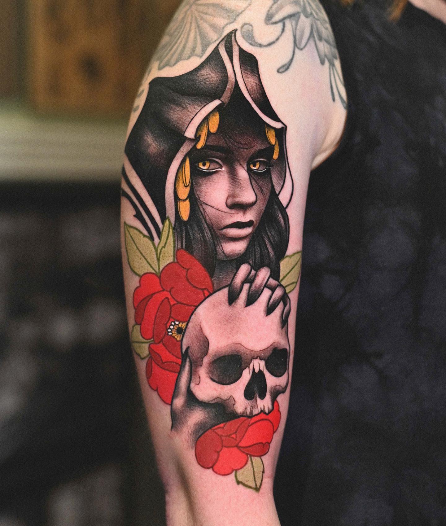Woman with skull American traditional tattoo on the forearm by Lorenzo Lopez