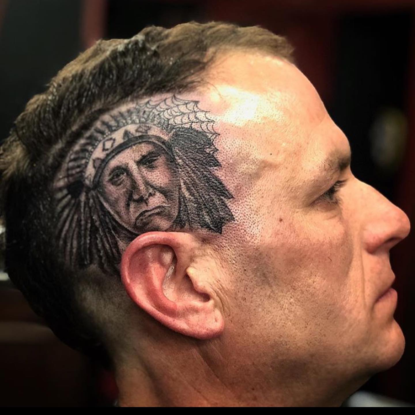 Indian chief dotwork tattoo on the head by Caitlin Curtis Tattoos & Booking, Dayton, Ohio
