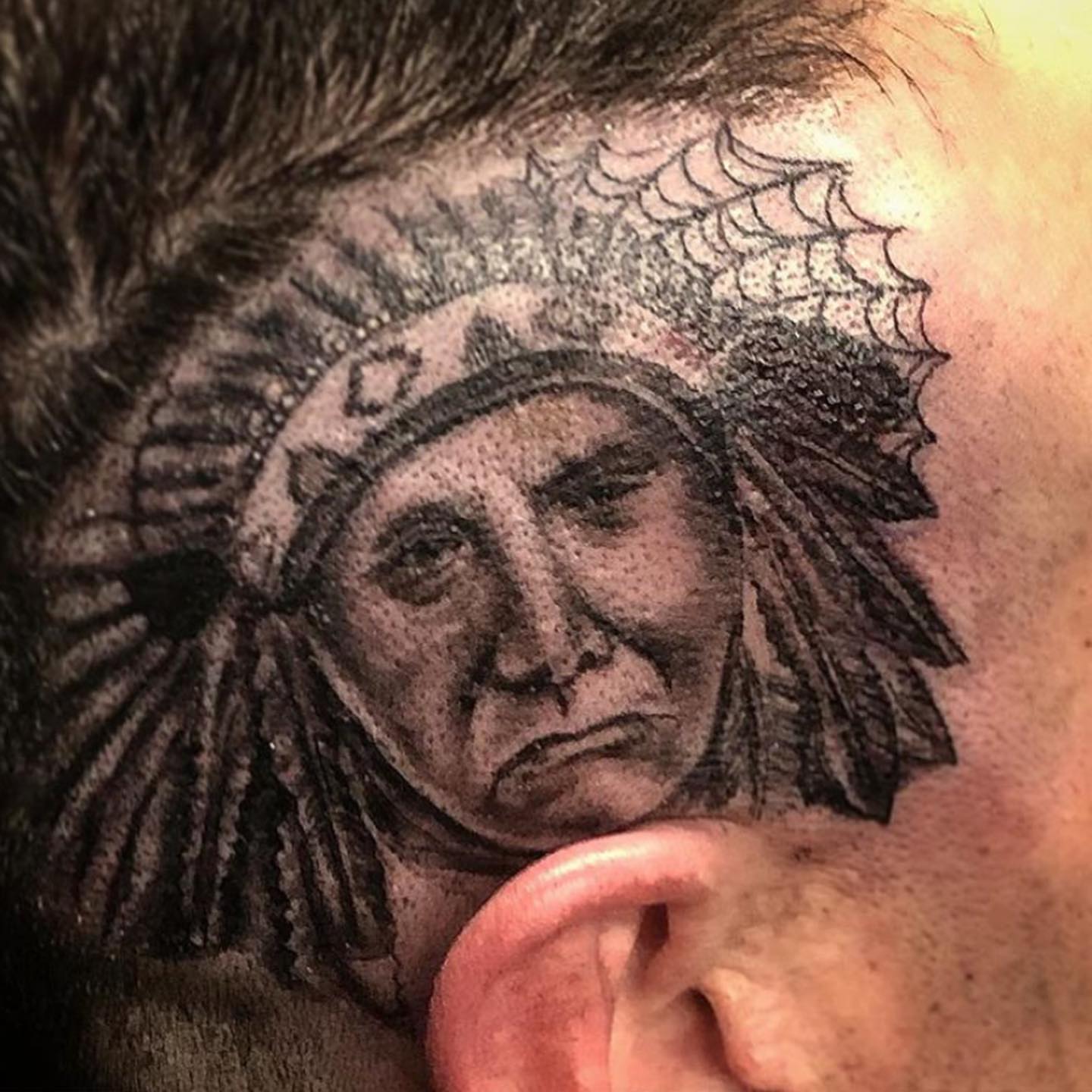 Indian chief realism tattoo on the head by Caitlin Curtis Tattoos & Booking, Dayton, Ohio