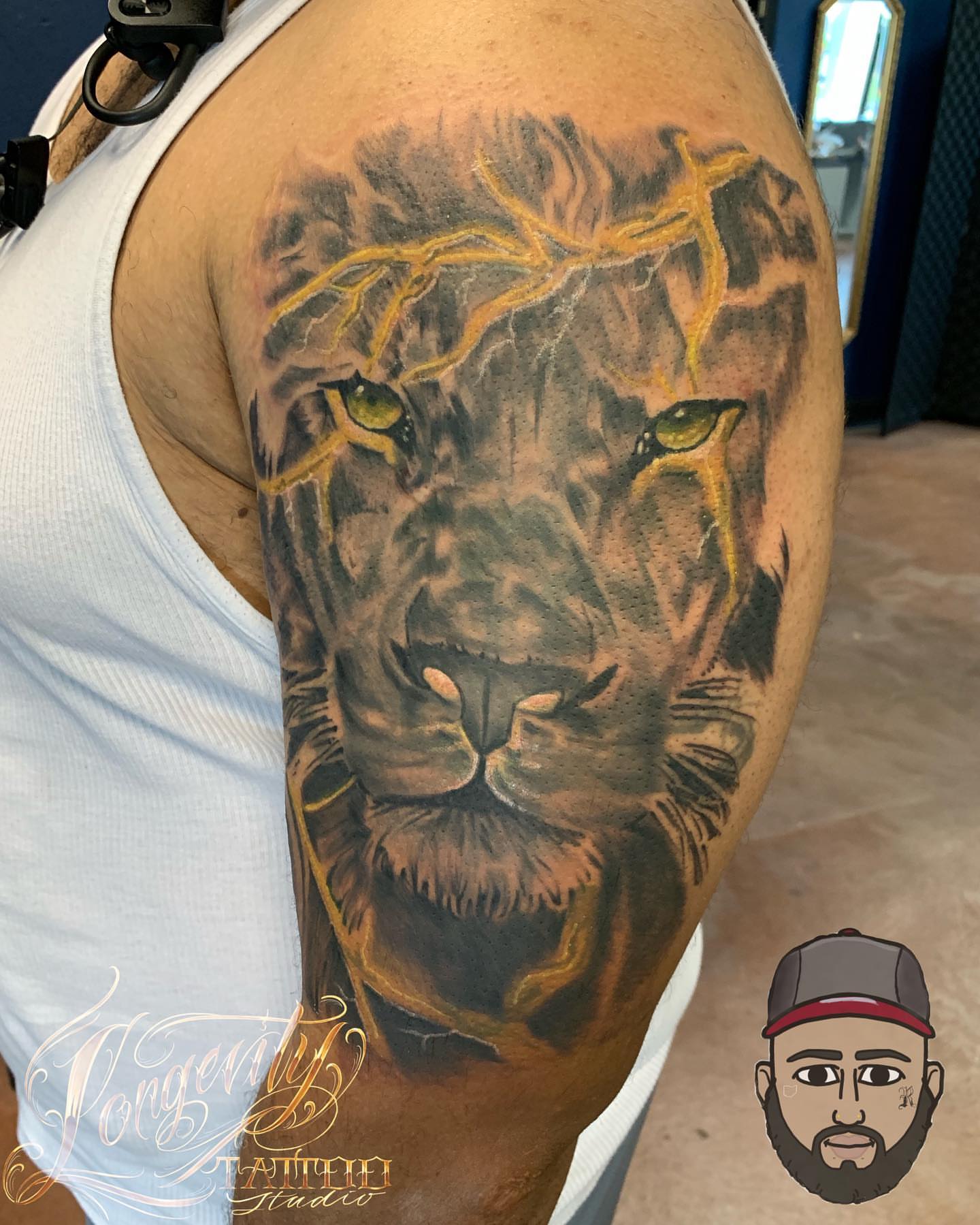 Lion realism tattoo on the shoulder by Mikeyftsk2