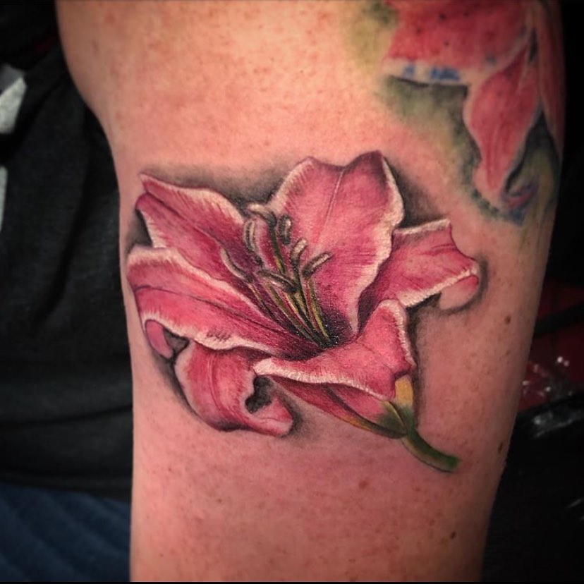 Lily realism tattoo on the forearm by Caitlin Curtis Tattoos & Booking, Dayton, Ohio