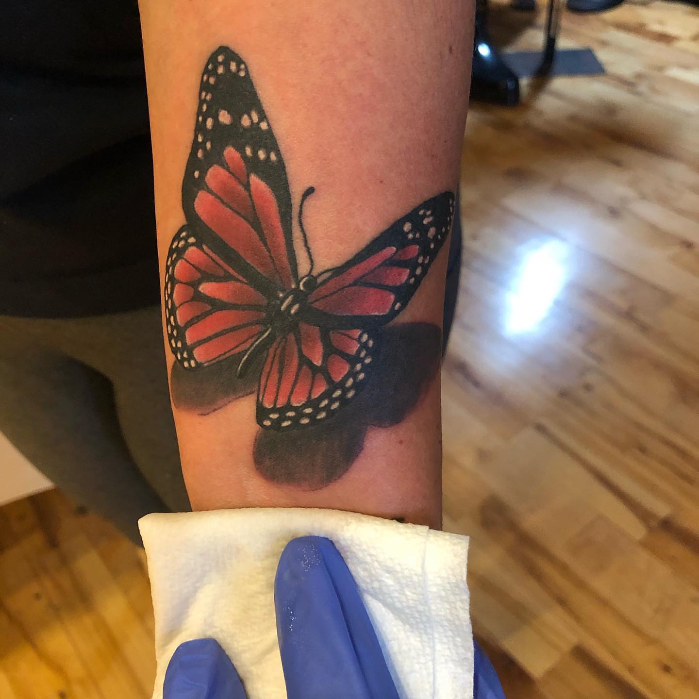 Monarch butterfly realism tattoo on the forearm by A.W.