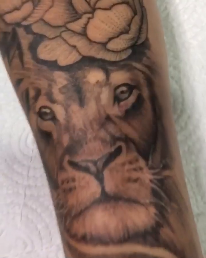 Lion and roses on forearm Chicano tattoo on the forearm by PrimaTa’ttoo_021