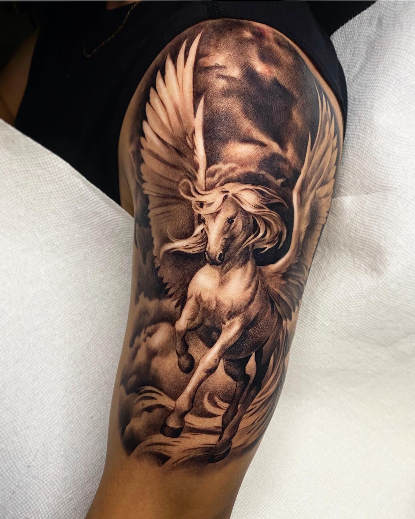Pegasus realism tattoo on the forearm by Ivan Guadalupe guzman