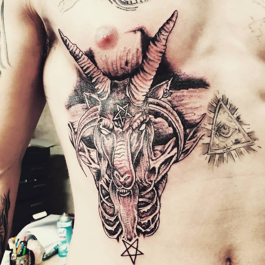 Goat head realism tattoo on the chest by Louie Vee Guddah