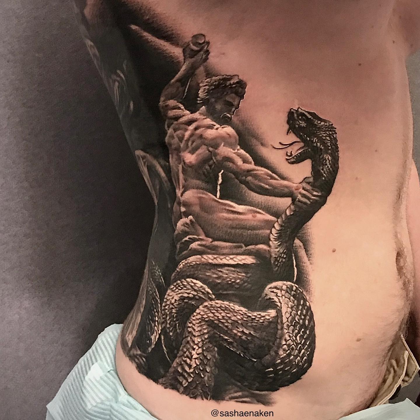 Tattoo by @sashaenaken — black_and_grey, realism