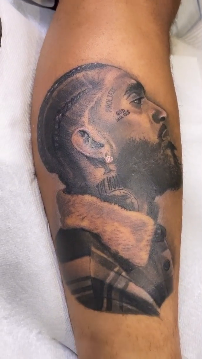 Portrait of Nipsey Hussle realism tattoo by ๐ฝ๐๐๐๐๐๐๐ ๐ถ๐๐๐