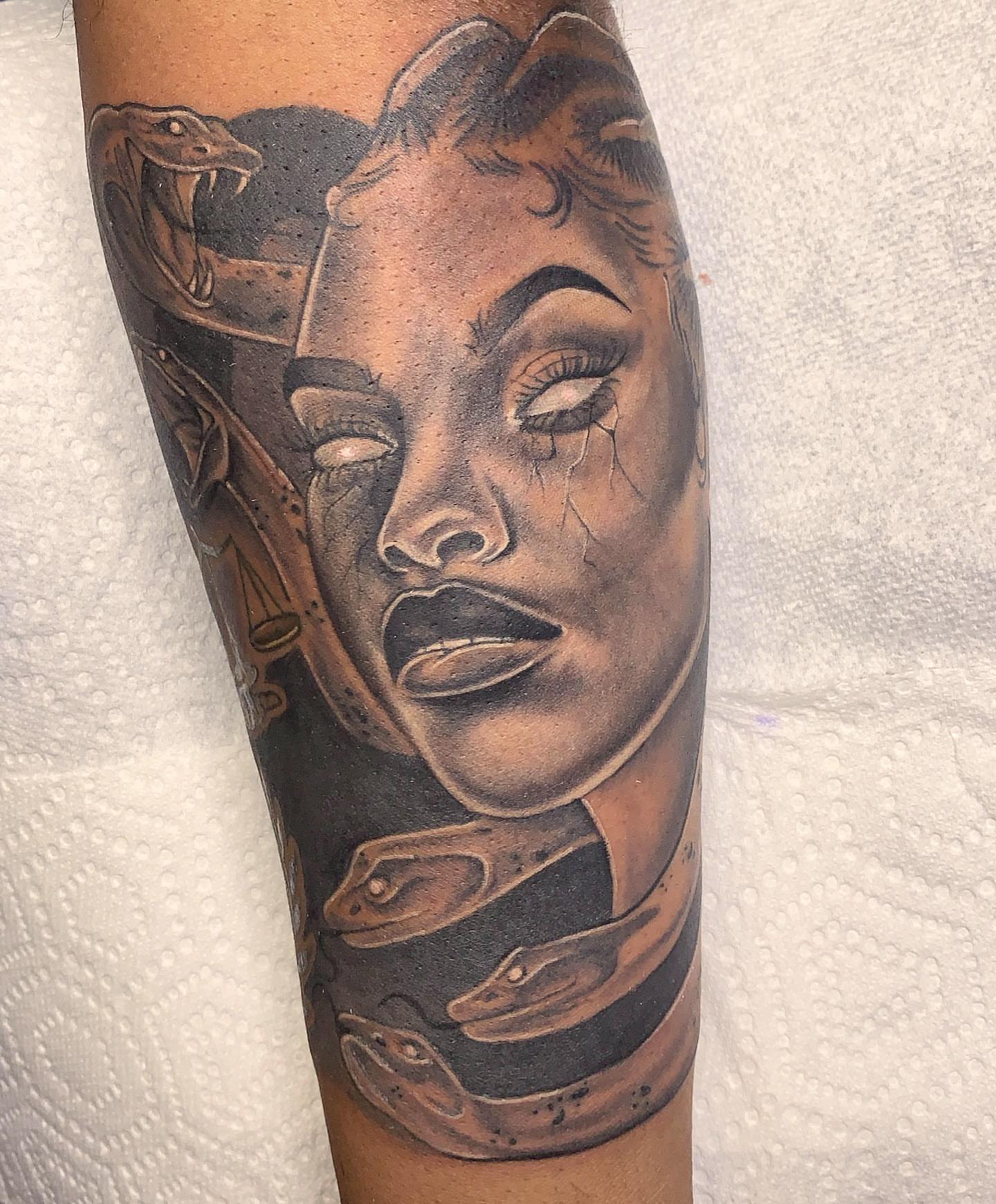 Woman's face with snakes realism tattoo on the forearm by The Tattoo Saint- DMV Tattoo Artist, Hyattsville, Maryland