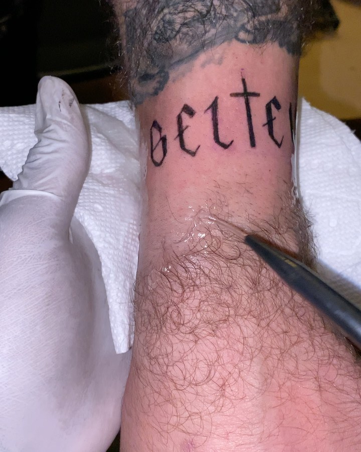 Lettering lettering script tattoo on the forearm by Daniel Monyongo