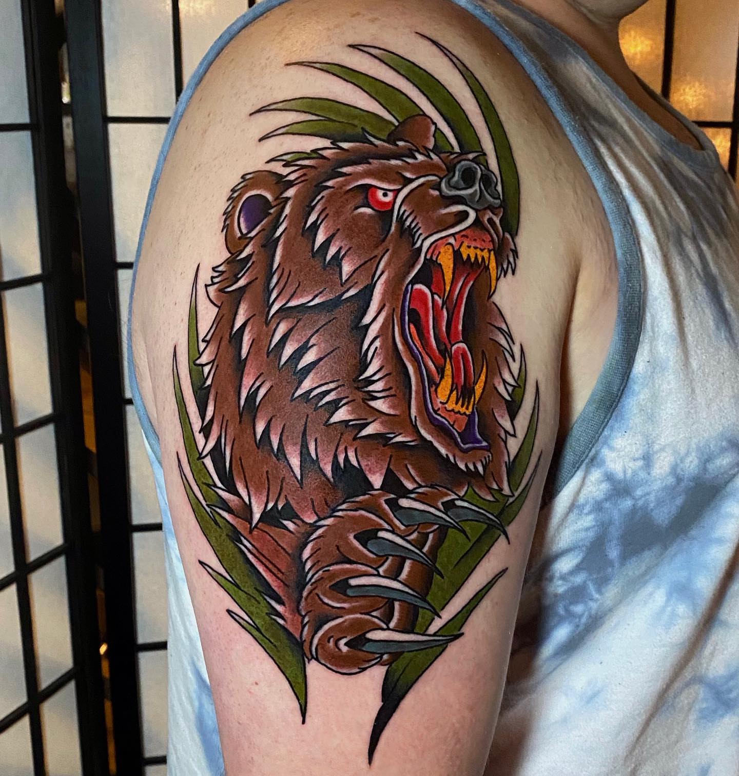 Roaring bear American traditional tattoo on the shoulder by David Mendieta