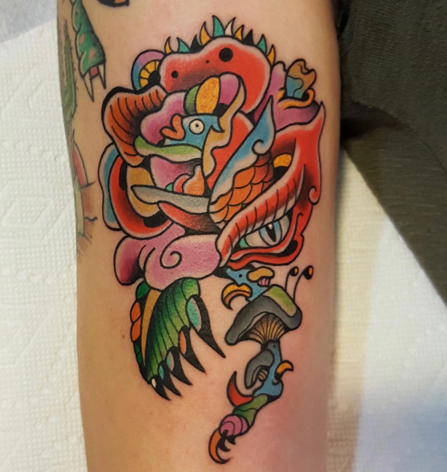 Abstract dragon American traditional tattoo on the forearm by David Mendieta