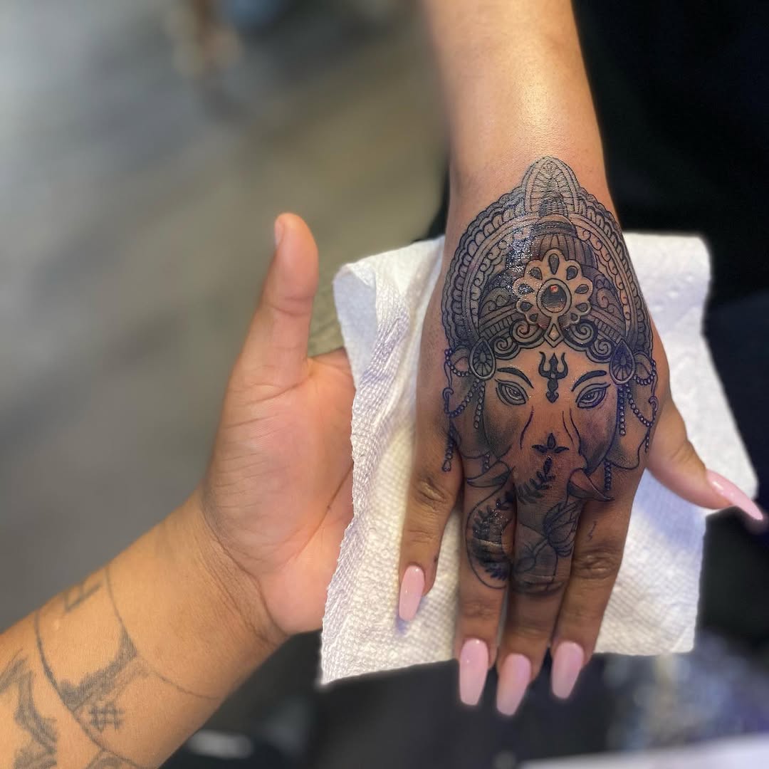 Ganesha face on hand dotwork tattoo on the hand by 2realink - Tattoo Artist