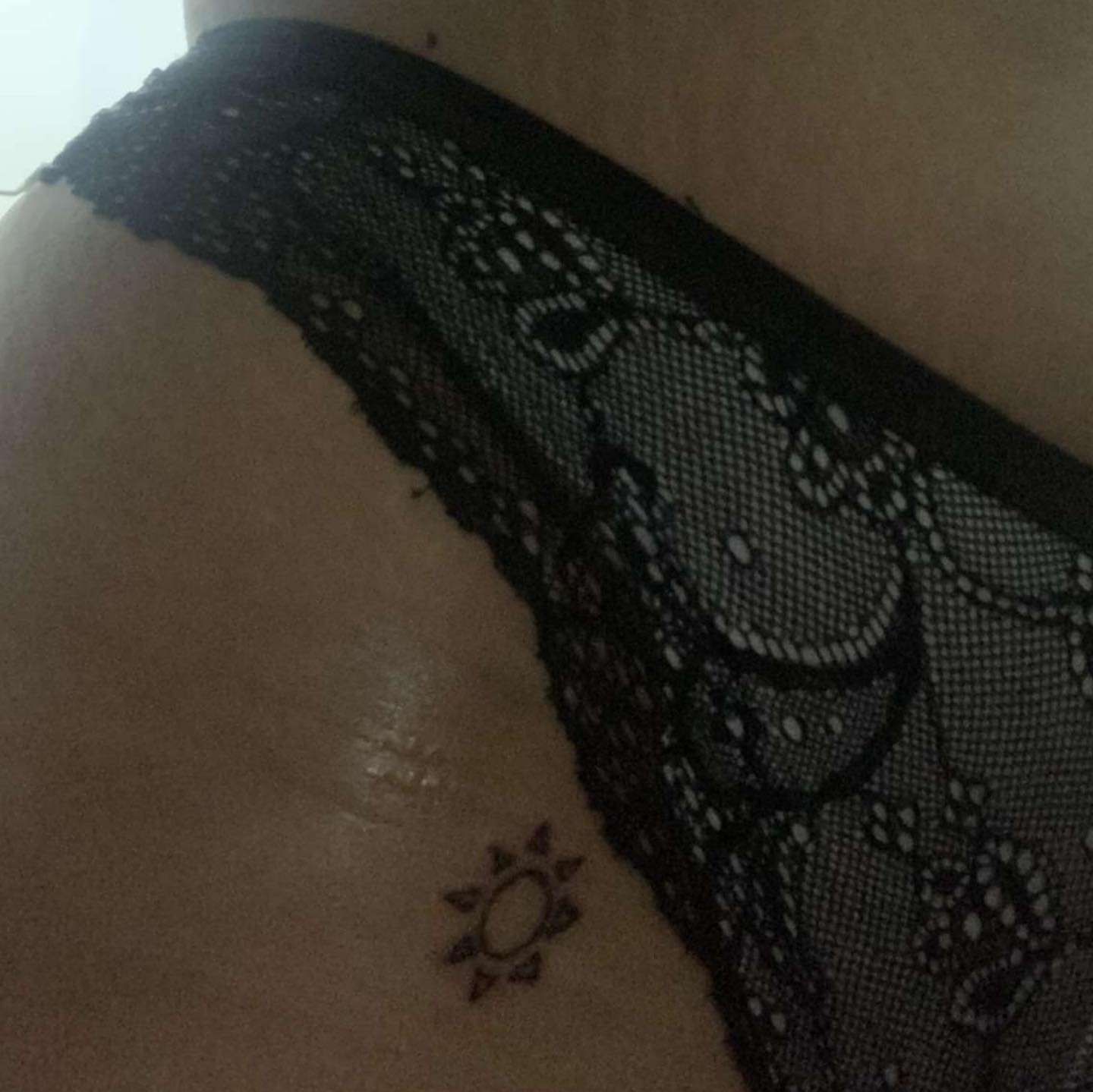 Sun geometric tattoo on the thigh by Daniel Monyongo