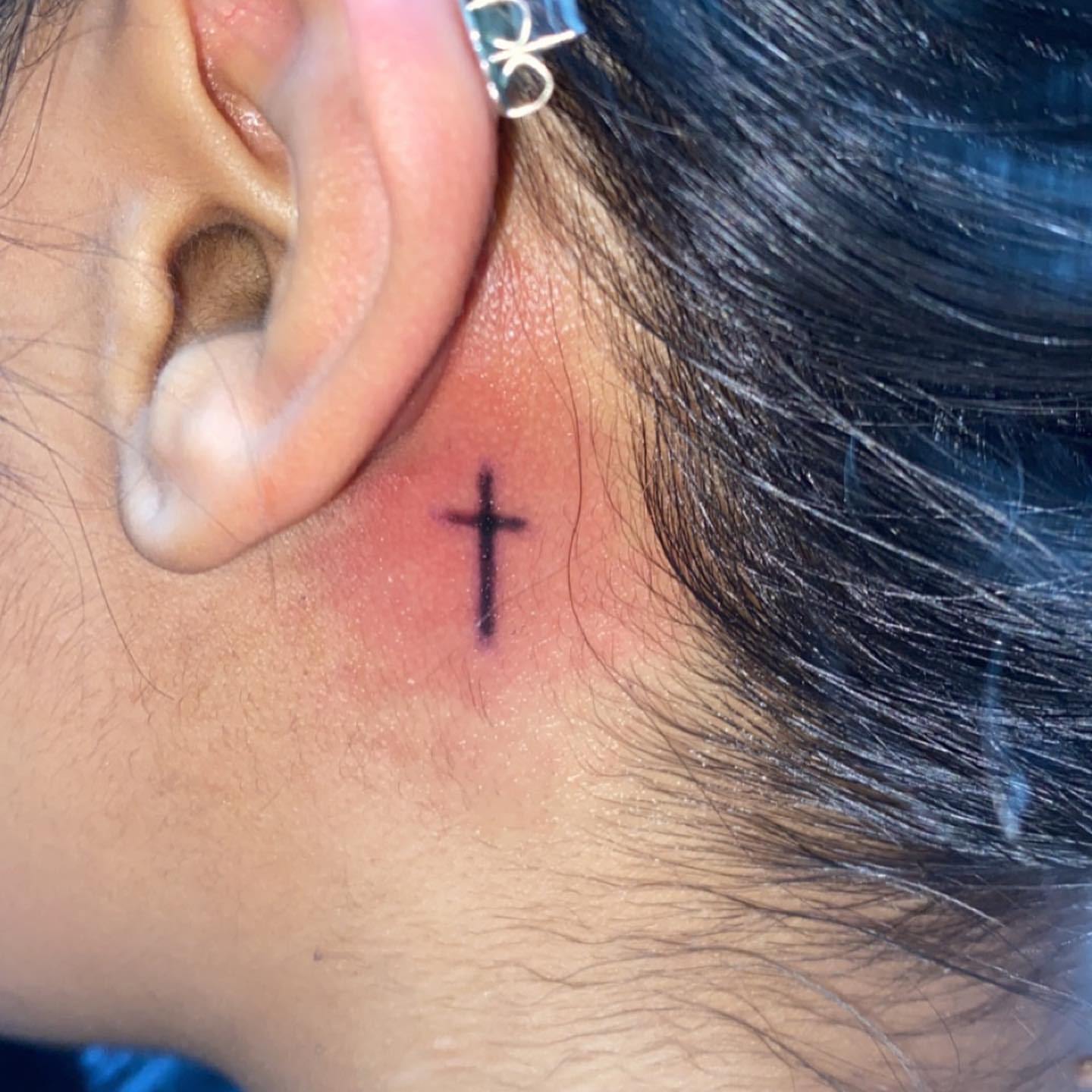Cross black and grey tattoo on the neck by Daniel Monyongo