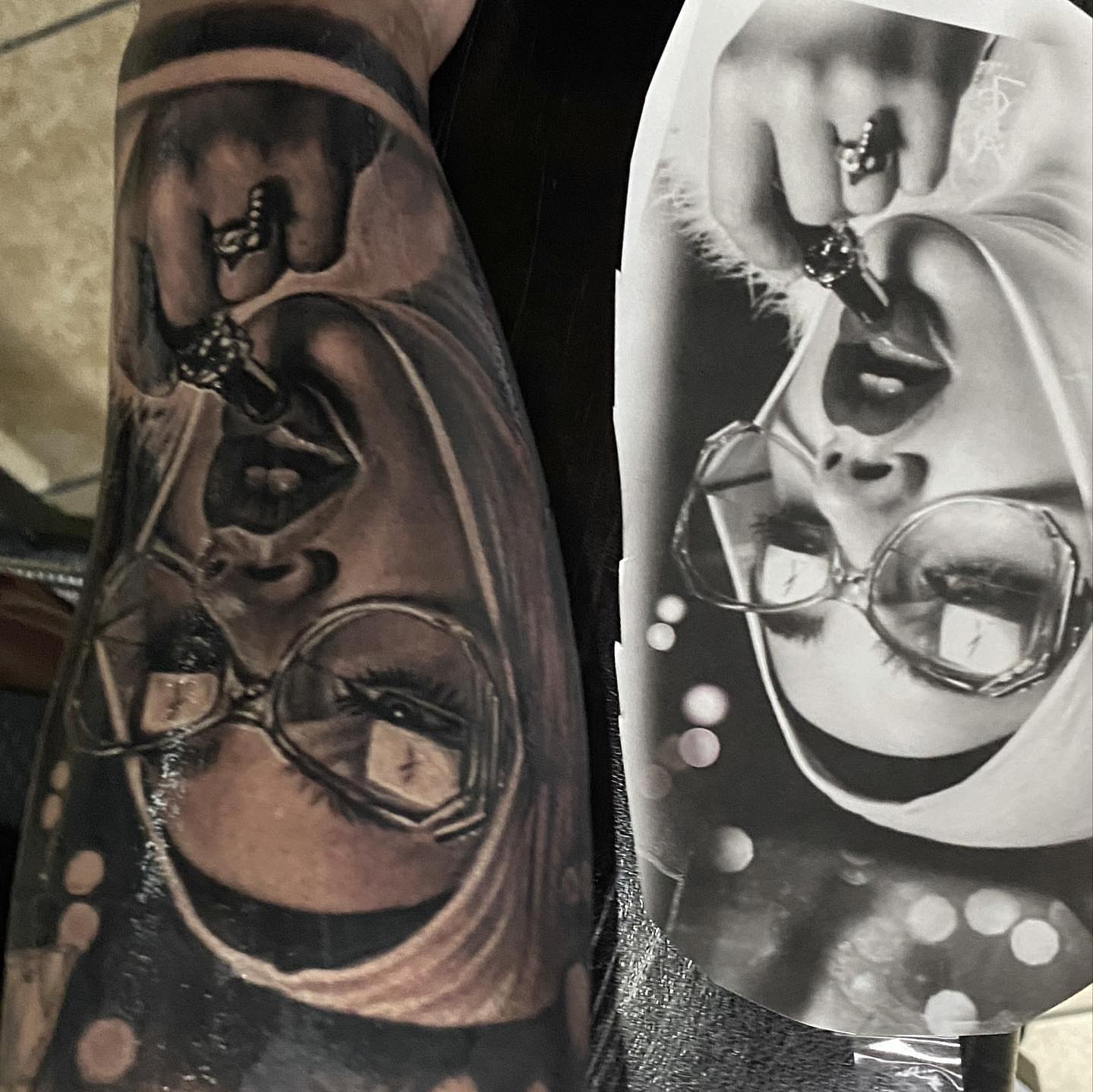 Woman wearing glasses realism tattoo on the forearm by Gary Graves