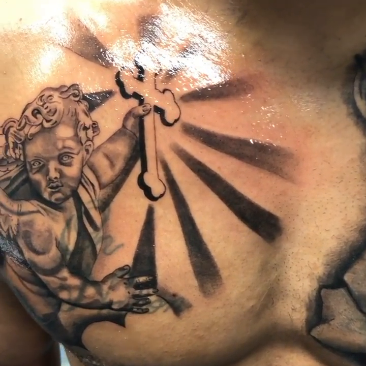 Cherub and cross realism tattoo by Tattoos by Rey G.