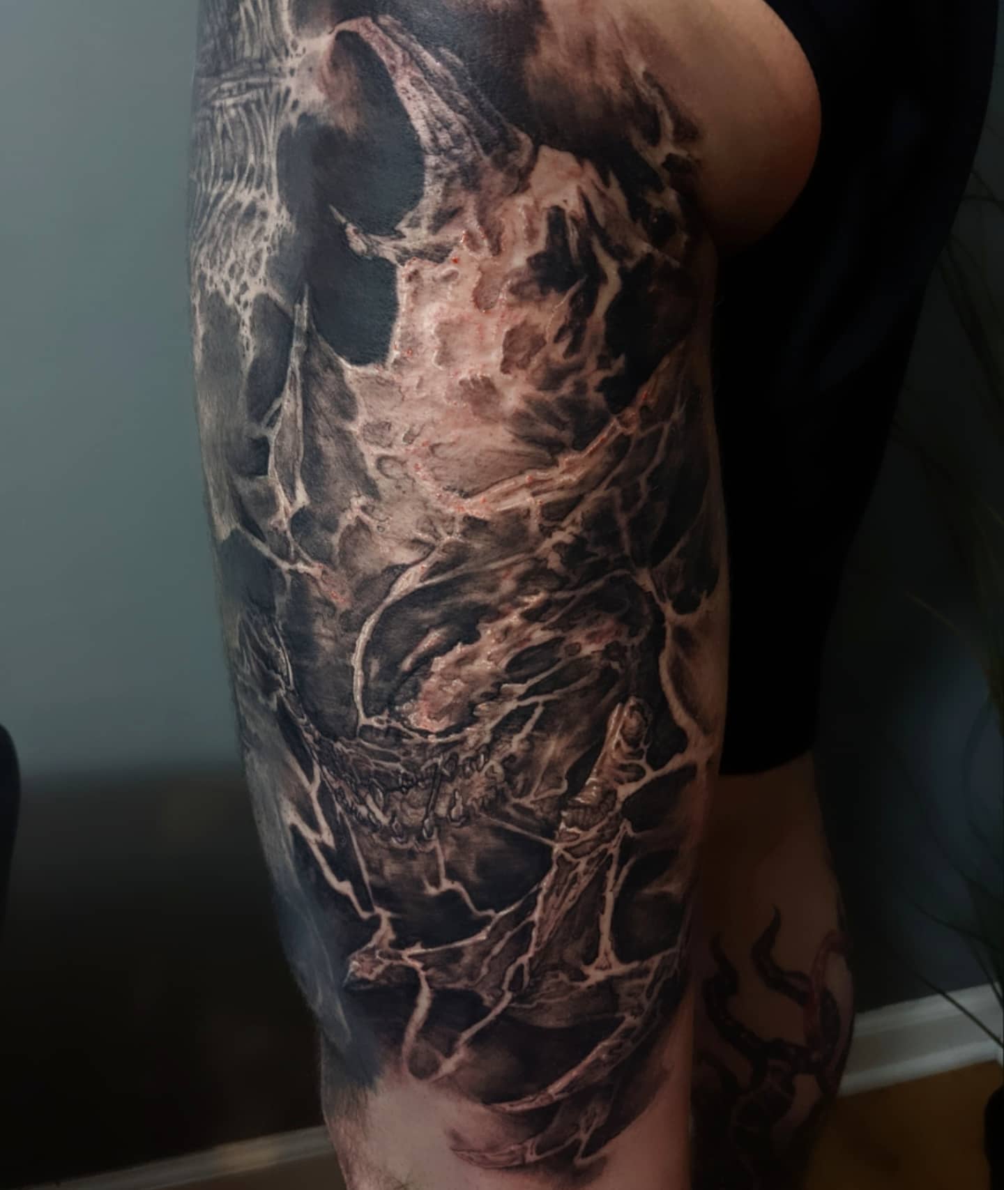 Tattoo by @allituttle — dark_realism, black_and_grey
