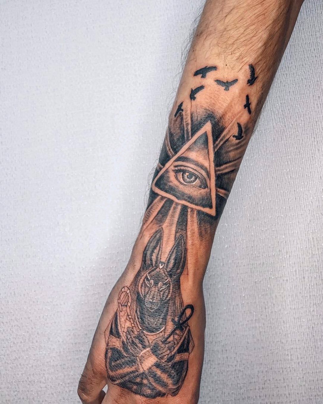Eye of horus black and grey tattoo on the forearm by Annie Overchuk