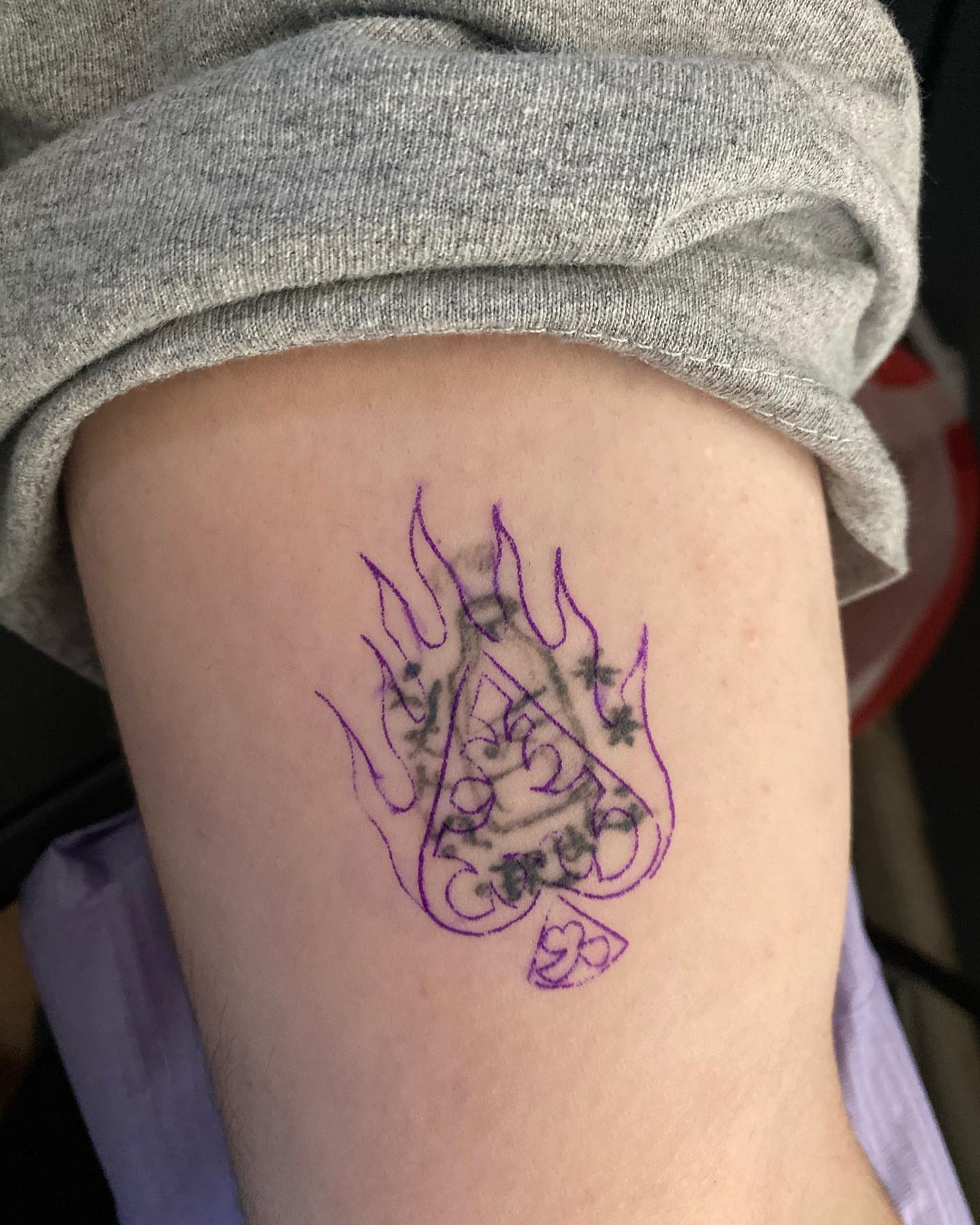 Flame and script new school tattoo on the thigh by Steph π€