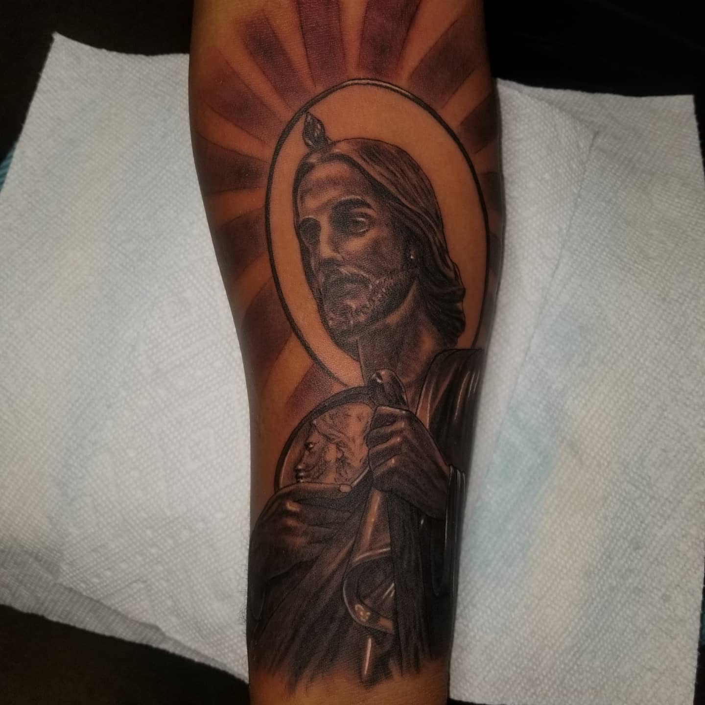 Religious figure realism tattoo on the forearm by Miguel-C, Houston, Texas